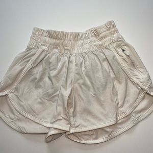 White Lululemon shorts with side zipper